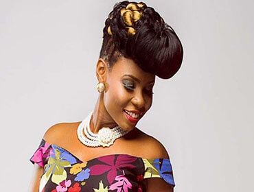 A few of Yemi Alade's show stopping hairstyles .